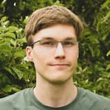 Svante Bengtson in front of a background of leaves